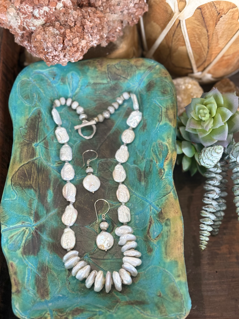 Mother of pearl necklace and earring set with moonstone accents Image