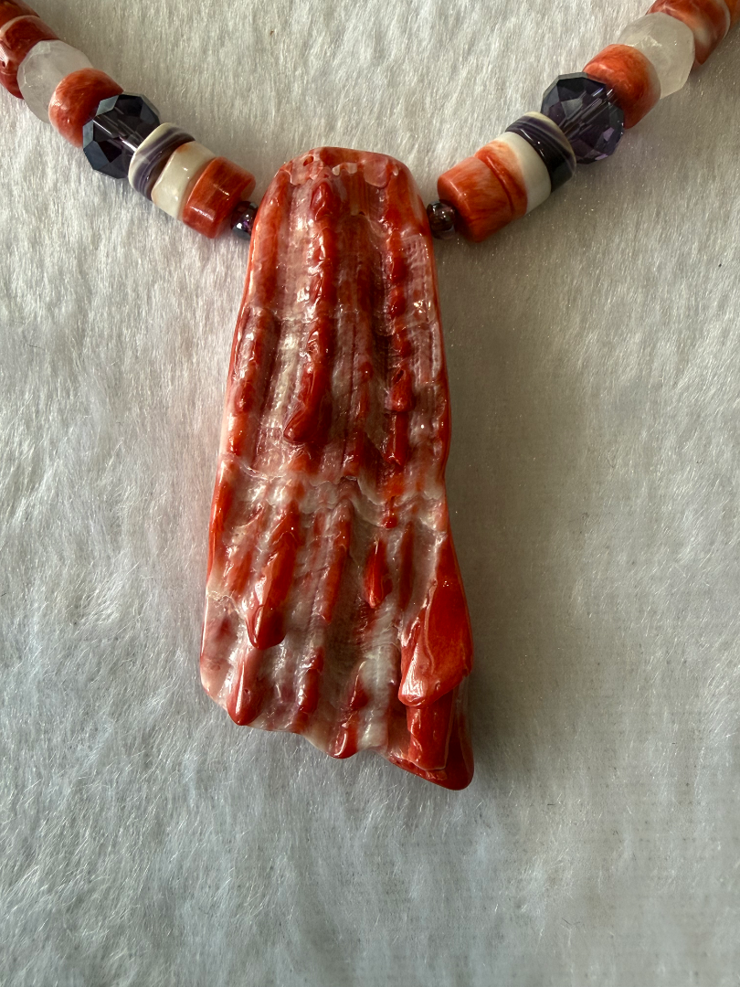 Red orange spiny oyster necklace, and earrings set with crystal accents Image